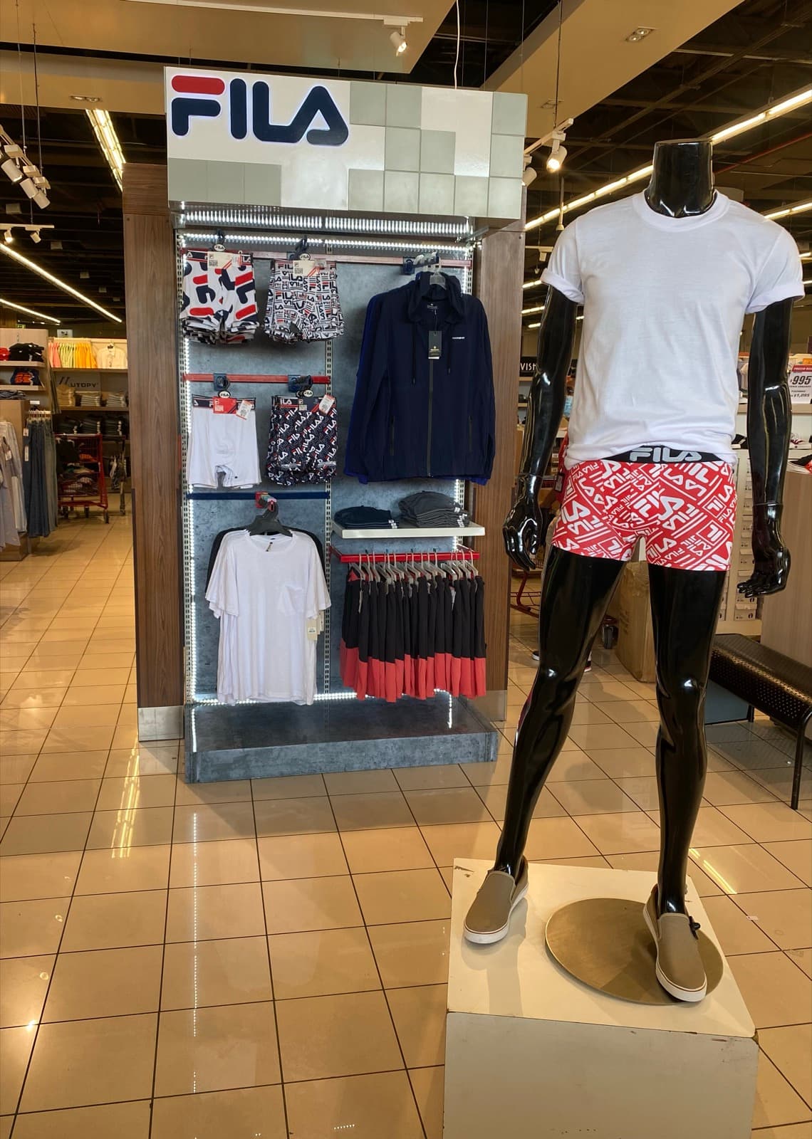 Visual merchandising wall display — Mondino, Dominican Republic