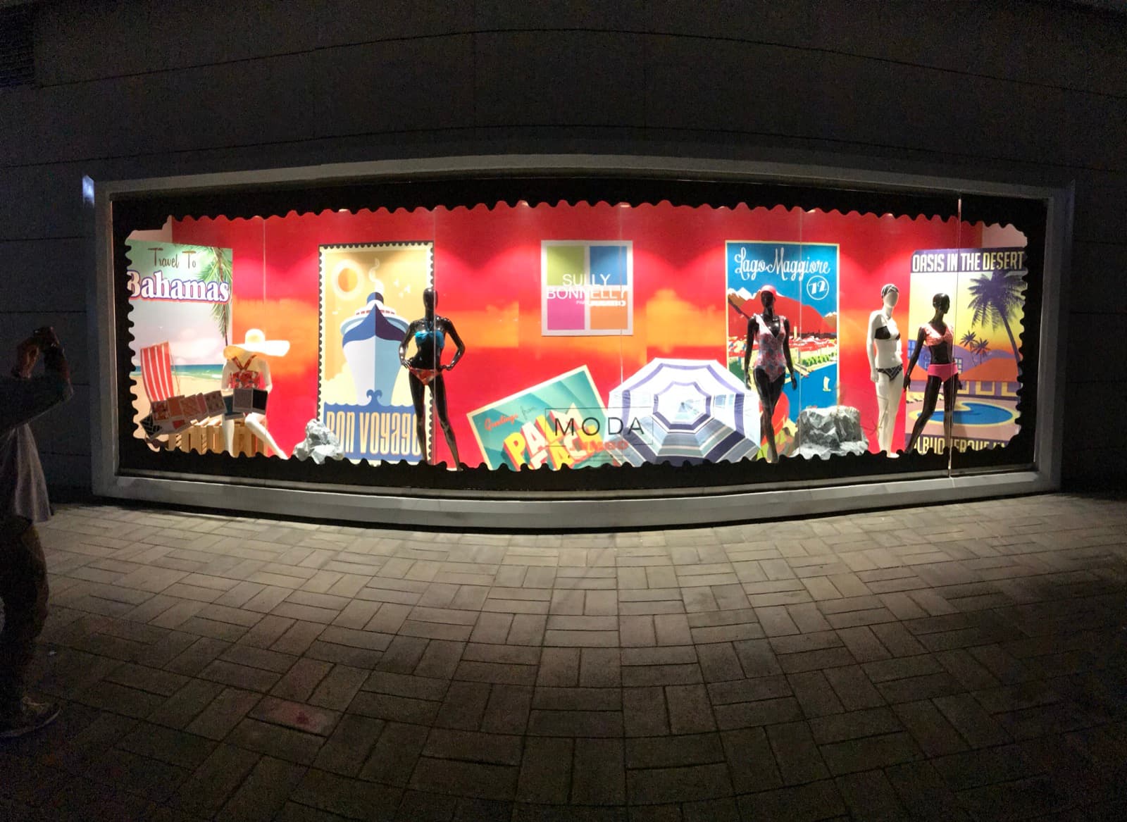 Visual merchandising floor display — folded and hanging product